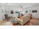 Inviting living room with hardwood floors, neutral tones, and comfortable seating arrangement at 316 5Th N Ave, Safety Harbor, FL 34695