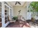 Charming patio featuring brick floors, comfortable seating and decor, perfect for enjoying the outdoor breeze at 316 5Th N Ave, Safety Harbor, FL 34695