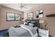 Comfortable bedroom with soft colors, two windows, and a well-dressed bed at 3251 34Th N Ave, St Petersburg, FL 33713