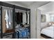 Closet with clothes and door leading to bed at 3251 34Th N Ave, St Petersburg, FL 33713