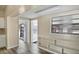 Bright dining room features built in storage and shelving and a view to the exterior through a large window at 3251 34Th N Ave, St Petersburg, FL 33713