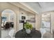 Open kitchen featuring white cabinets and modern appliances adjacent to the dining area at 3251 34Th N Ave, St Petersburg, FL 33713