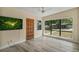Spacious living area with modern flooring and large windows for natural light at 3251 34Th N Ave, St Petersburg, FL 33713