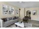 Inviting living area with stylish decor, a modern sofa, and a built-in bookcase at 3251 34Th N Ave, St Petersburg, FL 33713