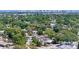 Scenic aerial view of the neighborhood and the surrounding tree canopy and landscape at 3251 34Th N Ave, St Petersburg, FL 33713