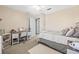 Inviting bedroom with desk, neutral tones, and soft carpet, perfect for relaxing at 32718 Summerglade Dr, Wesley Chapel, FL 33545
