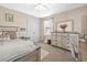Bright bedroom with ceiling fan, dresser, and decor creating a comforting space at 32718 Summerglade Dr, Wesley Chapel, FL 33545
