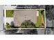 Aerial view of home showcasing roof, lot size, and proximity to other homes in the neighborhood at 3605 W Paxton Ave, Tampa, FL 33611