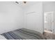 Bright bedroom showcasing a neutral color scheme with a closet, and light walls at 3605 W Paxton Ave, Tampa, FL 33611