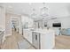 Spacious kitchen with island, stainless steel appliances, and open floor plan at 3711 W Barcelona St, Tampa, FL 33629