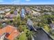 Aerial view of the neighborhood showcasing the canal system, homes, and lush landscaping at 4612 Barracuda Dr, Bradenton, FL 34208