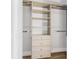 Custom closet with built-in shelving and drawers for optimal storage and organization at 4612 Barracuda Dr, Bradenton, FL 34208