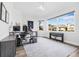 Home office with natural light, a large window, and neutral tones and wood-look floors at 4612 Barracuda Dr, Bradenton, FL 34208