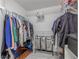 Walk-in closet with clothing racks, storage, and wire shelving at 4951 Musselshell Dr, New Port Richey, FL 34655