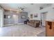Open living room with tile flooring and comfortable furniture at 4951 Musselshell Dr, New Port Richey, FL 34655