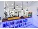 A bar with wood countertop and blue LED lighting at 721 Brightwaters Ne Blvd, St Petersburg, FL 33704