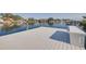 Spacious boat dock featuring seating and ample space to enjoy the scenic waterfront view at 721 Brightwaters Ne Blvd, St Petersburg, FL 33704