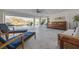 This spacious entertainment space features comfortable seating, custom bar and a beautiful pool view at 721 Brightwaters Ne Blvd, St Petersburg, FL 33704