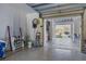 Garage featuring ample storage, and convenient access to the home's outdoor spaces and entertainment areas at 721 Brightwaters Ne Blvd, St Petersburg, FL 33704