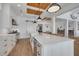 Spacious kitchen with a large island, stainless steel appliances, and open layout to dining area at 721 Brightwaters Ne Blvd, St Petersburg, FL 33704