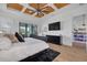 A main bedroom with wood ceilings and a private balcony at 721 Brightwaters Ne Blvd, St Petersburg, FL 33704