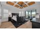 A main bedroom with wood ceilings and a private balcony at 721 Brightwaters Ne Blvd, St Petersburg, FL 33704