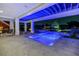 Outdoor pool with waterfront view and covered patio area at 721 Brightwaters Ne Blvd, St Petersburg, FL 33704