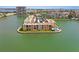 Beautiful waterfront condos with a community pool surrounded by lush tropical landscaping at 7645 Sun Island S Dr # 207, South Pasadena, FL 33707