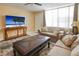 Cozy living room with stylish decor and plenty of natural light at 7645 Sun Island S Dr # 207, South Pasadena, FL 33707
