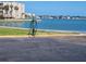 Exterior image showcasing the community water access with washing hose at the dockside at 7645 Sun Island S Dr # 207, South Pasadena, FL 33707