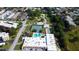A beautiful aerial view shows the community includes tennis courts, swimming pool, and green spaces at 8198 Terrace Garden N Dr # 109, St Petersburg, FL 33709