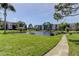 Well-maintained community lake with a serene view at 8198 Terrace Garden N Dr # 109, St Petersburg, FL 33709