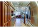 Updated kitchen with stainless steel appliances, granite countertops, and wood cabinets at 8198 Terrace Garden N Dr # 109, St Petersburg, FL 33709