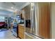 Modern kitchen features stainless steel refrigerator and plenty of cabinet space at 8198 Terrace Garden N Dr # 109, St Petersburg, FL 33709