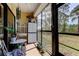 Screened-in lanai offering a relaxing outdoor space with room for seating at 8198 Terrace Garden N Dr # 109, St Petersburg, FL 33709