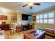 Bright living area with modern furniture, hardwood floors, and plantation shutters at 8198 Terrace Garden N Dr # 109, St Petersburg, FL 33709