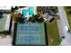 Overhead shot of tennis courts next to the community pool provides plenty of space to enjoy outdoor activities at 8198 Terrace Garden N Dr # 109, St Petersburg, FL 33709