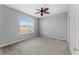 Bedroom with a window and ceiling fan at 8420 Deer Chase Dr, Riverview, FL 33578