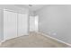 Bedroom with large closet and neutral walls and carpet at 8420 Deer Chase Dr, Riverview, FL 33578