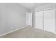 Bedroom with large closet and neutral walls and carpet at 8420 Deer Chase Dr, Riverview, FL 33578