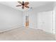 Bedroom featuring neutral walls, carpet, and a ceiling fan at 8420 Deer Chase Dr, Riverview, FL 33578