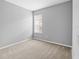 Bedroom featuring neutral walls and carpet, with a window offering natural light at 8420 Deer Chase Dr, Riverview, FL 33578