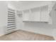 Walk-in closet features shelving and clothes racks at 916 Hemingway Cir, Tampa, FL 33602