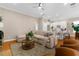 Open-concept living area seamlessly connecting the living room, dining space, and kitchen at 916 Hemingway Cir, Tampa, FL 33602