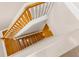 Wood staircase with white banister leading upstairs at 916 Hemingway Cir, Tampa, FL 33602