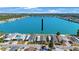 Aerial image of a home in a lakeside community, nestled by the serene lake with lush greenery around at 9416 Star Gazer Ln, Riverview, FL 33578