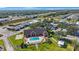 An aerial view features a community pool and recreational area close to a major highway at 9416 Star Gazer Ln, Riverview, FL 33578