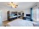 This bedroom features a bunk bed, desk, and reflected closet doors in the mirror at 9416 Star Gazer Ln, Riverview, FL 33578