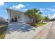 Charming single-story home with carport and landscaped yard at 9416 Star Gazer Ln, Riverview, FL 33578
