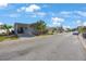 View of home and landscaping from street at 9416 Star Gazer Ln, Riverview, FL 33578